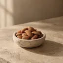 Almonds, photographed on stone.