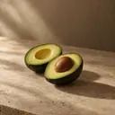 Avocado, photographed on stone.
