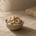 Cashews, photographed on stone.