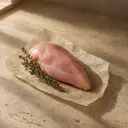 Chicken, photographed on stone.