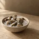 Clams, photographed on stone.