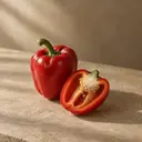 Red bell pepper, photographed on stone.