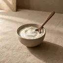 Yogurt, photographed on stone.