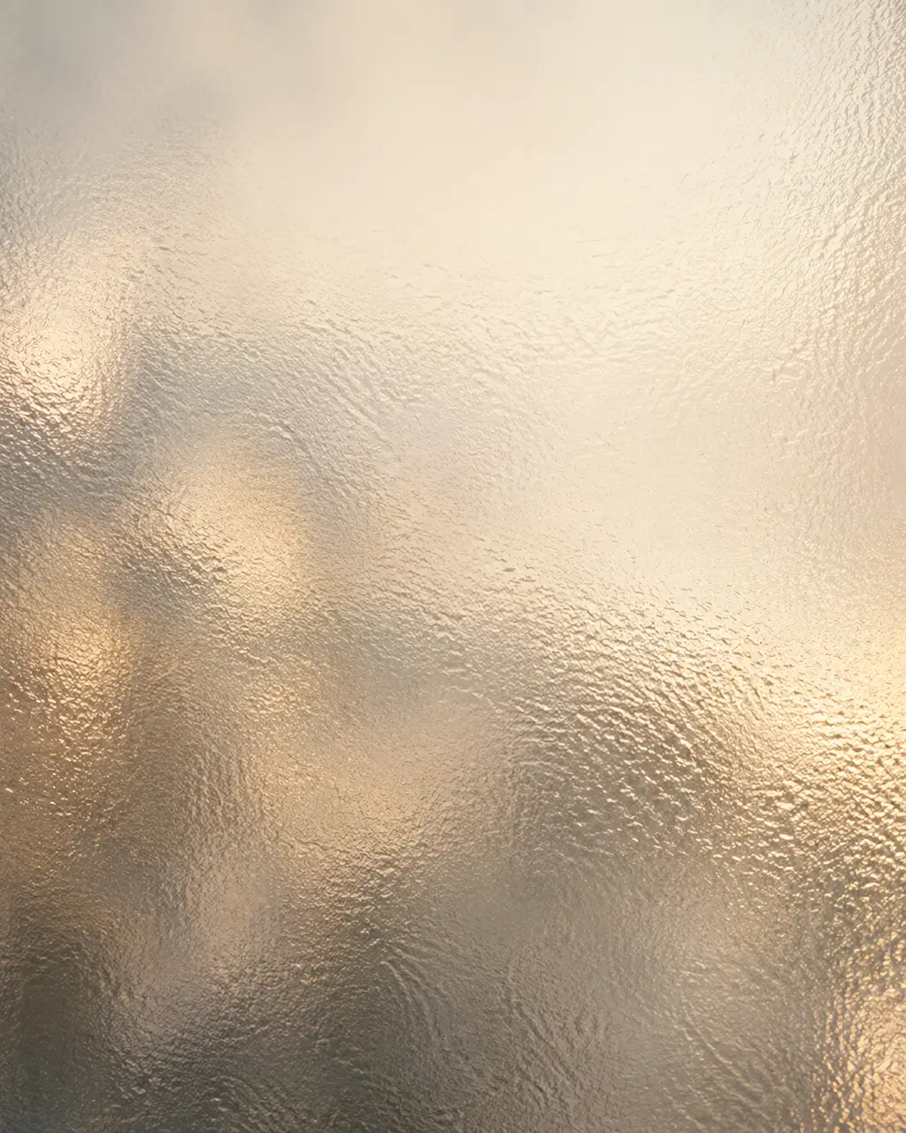 Warm light through a frosted glass pane